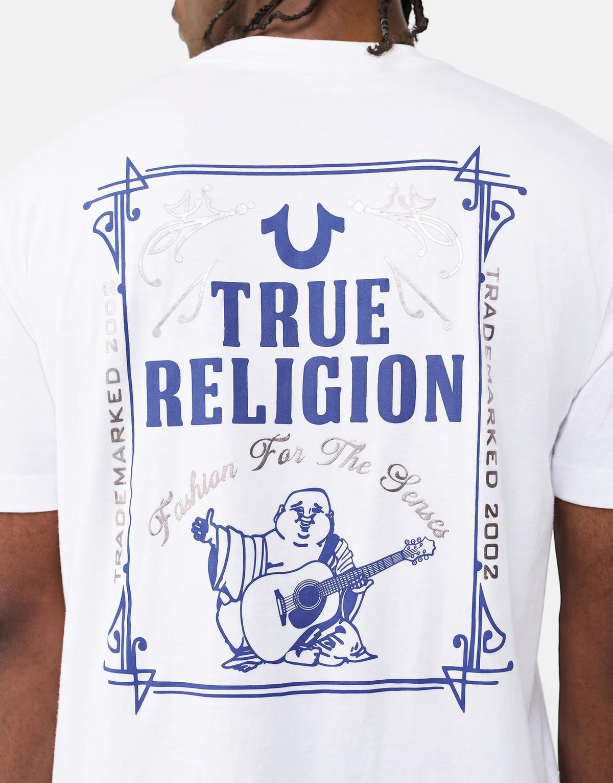 White True Religion TR Rect T-shirt for men, featuring a blue graphic print of a Buddha playing guitar on the back.