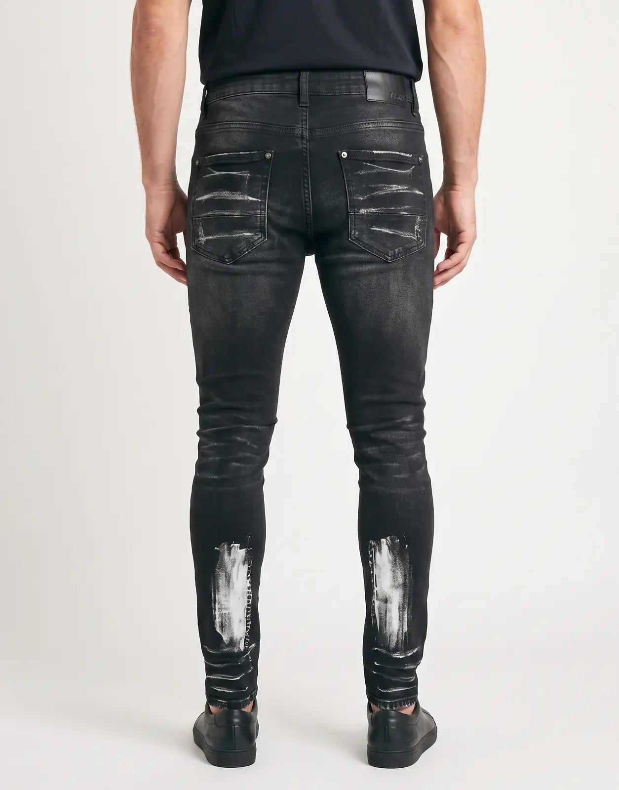 Vialli Gaserk Black Jeans in black denim with distressed white paint markings on back pockets and lower legs.